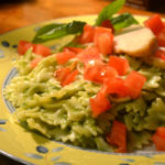 plated-pesto-pasta-with-chicken-with-basil-garnish05-580x447